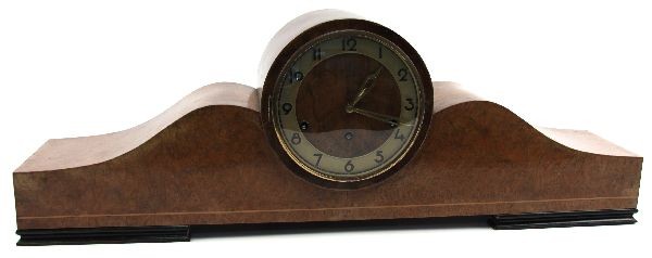 ALLEI ART DECO BIRDS EYE MAPLE MANTLE CLOCK: A German mantle clock from the art deco period. Case is birds eye maple veneer. Clok has arabic numerals and brass movement. Key and pendulum are present.