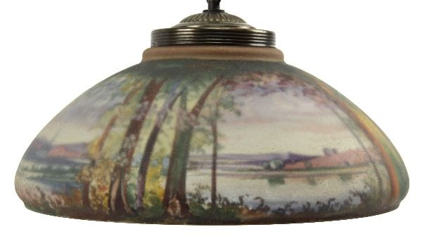 H. FISHER SIGNED REVERSE PAINTED HANGING LAMP: A beautifully executed reverse painted lamp signed on inside in reverse by H. Fisher who painted for Pairpoint lamp company . Scene is a colorful majestic scene with trees water and a church in the di