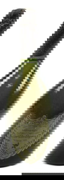 1975 DOM PERIGNON CUVEE CHAMPAGNE-750ML BOTTLE: Monet et Chandon Cuvee Dom Perignon 750ml bottle. 12.7% abv. Into the neck fill level. Cork and foil intact. Label in very good condition.