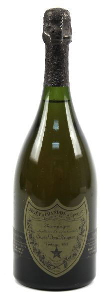 1973 DOM PERIGNON CUVEE CHAMPAGNE-750ML BOTTLE: Monet et Chandon Cuvee Dom Perignon 750ml bottle. 12.7% abv. Into the neck fill level. Cork and foil intact. Label in very good condition.