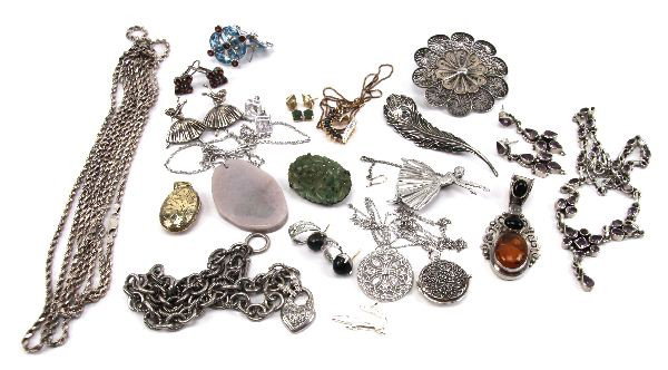 MIXED LOT OF ANTIQUE & FASHION STERLING JEWELRY: A good collection of sterling silver jewelry with many pieces with semi-precious gemstones, including an Edwardian style amethyst earring and necklace set, an antique carved jade pin, a Tiffany style 