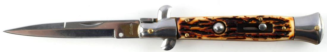 9 INCH STAG HANDLE STILLETO SWITCHBLADE KNIFE: Switchblade. 9 inches open. Stag handle grip. Stilleto brand on blade. Very good condition.