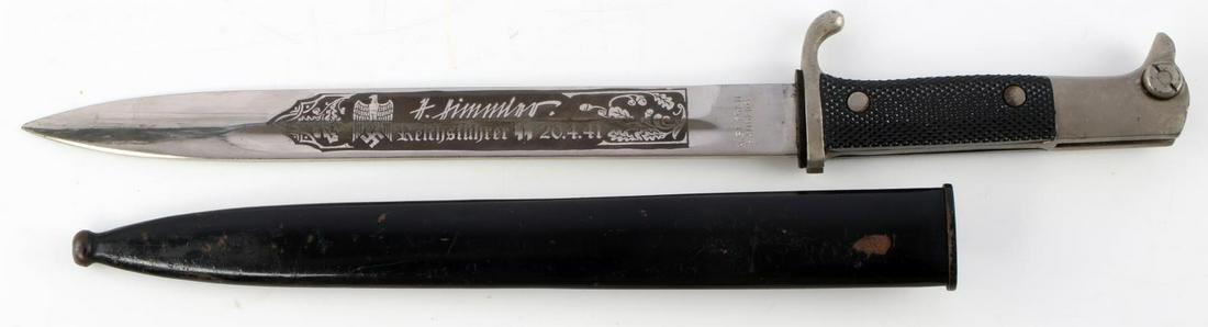 WWII GERMAN REICH SS HIMMLER ETCHED DRESS BAYONET: Third Reich Himmler etched long bayonet. Blade features Himmler's signature with Reichsfuhrer SS 20.4.41. Blade is marked A. Seysen Bamberg and E. Pack & Sohne maker marked. Nickel finger guard and po