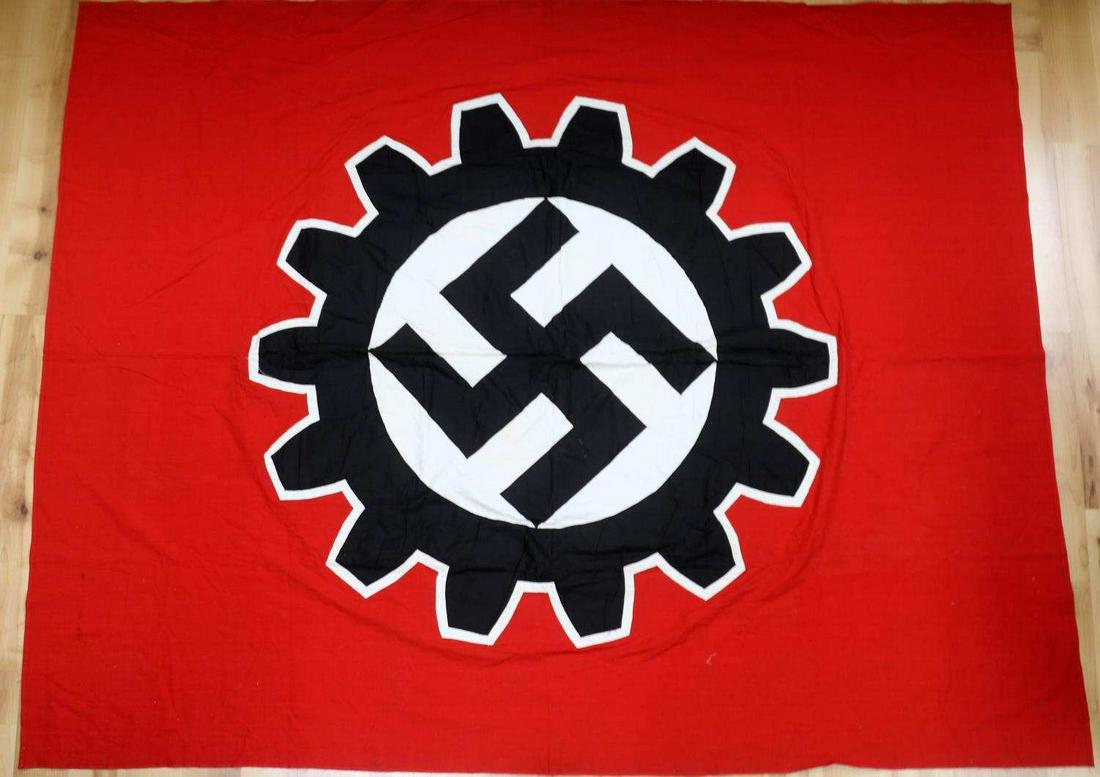 WWII GERMAN THIRD REICH DAF LABOUR BANNER FLAG: Flag for German Labour Front. Measures 56 inches tall by 70 inches wide. Stitched design on both sides. No tags or stamps. No rips, slight staining to center. Does not fluoresce,