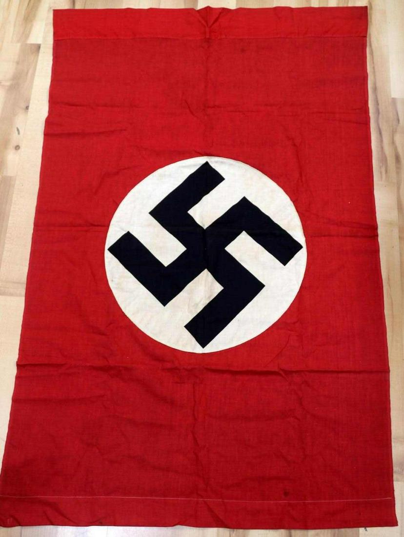 WWII GERMAN THIRD REICH NATIONAL PARTY FLAG: Third Reich national party flag. Red, white, and black banner with national party symbol. Measures 40 X 30 inches. Very good condition. Non-fluorescing.