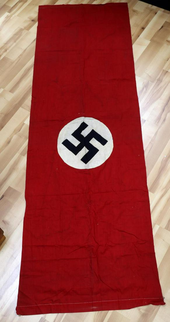 WWII GERMAN THIRD REICH NATIONAL PARTY FLAG BANNER: Third Reich National Party flag. Multipiece construction. Very good condition with some fading. Non-fluorescing. Measures 89 X 28 inches. Very good condition with some discoloration.