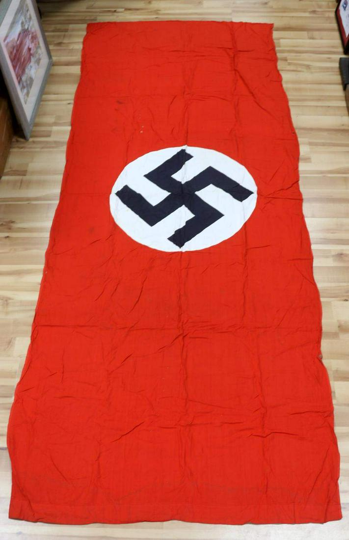 WWII GERMAN THIRD REICH NATIONAL PARTY BANNER FLAG: Third Reich national banner with party symbol. Multipiece construction. Measures 120 X 46 inches. Very good condition. Roundel fluoresces.