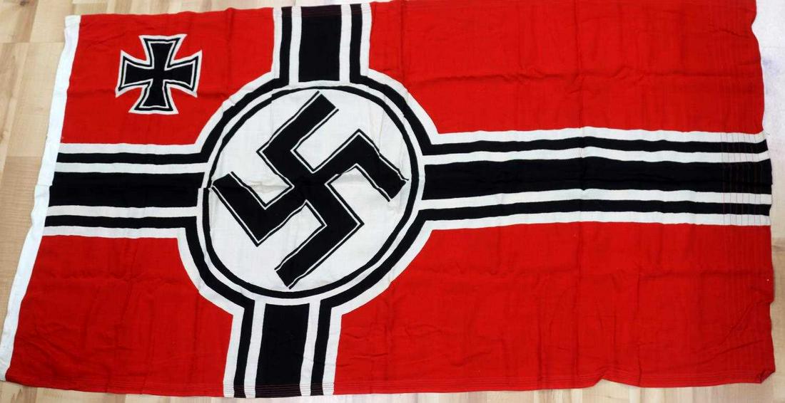 WWII GERMAN THIRD REICH NAVAL KRIEGSMARINE FLAG: Third Reich Kriegsmarine flag. Measures 64 X 36 inches. Single pieces printed construction. Very good condition. Non-fluorescing. Hoist is marked R.KR.Fl. and G.A. Frohlichs Sohn A.G. Warnsdorf. Sud w