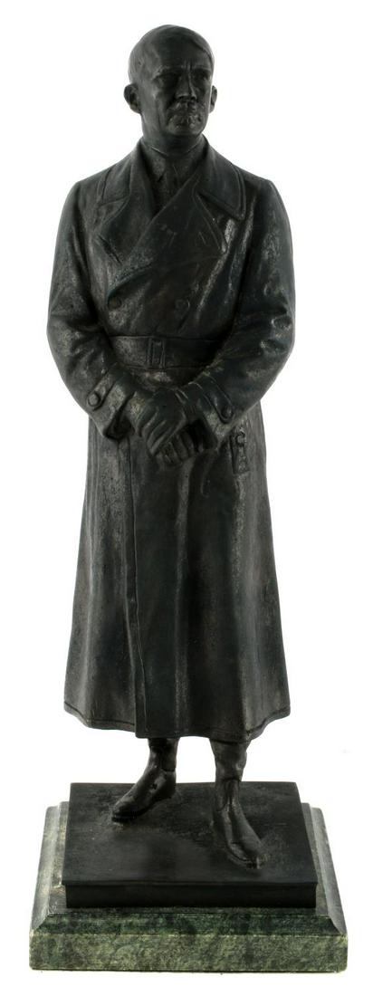 BRONZE FULL BODY STATUE OF FUHRER ADOLF HITLER: Full body bronze statue of German Chancellor Adolf Hitler. Stands upon marble base. Measures 20 X 7 inches overall. Hitler himself measures 17 1/2 inches tall. In very good condition, signed on the ba