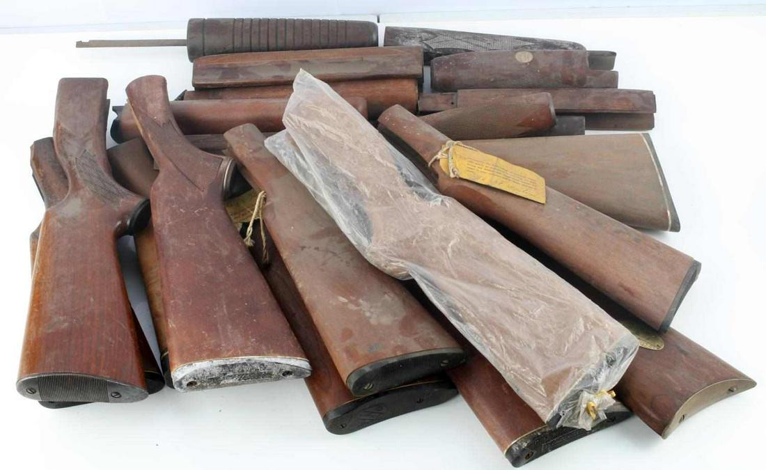LOT OF 11 STOCKS AND 10 FORESTOCKS SMITH & WESSON: Lot of 11 butt-stocks and 10 fore-stocks from Smith & Wesson, Marlin Firearms, Winchester and others. Stocks all in good condition, some perhaps a little dusty.