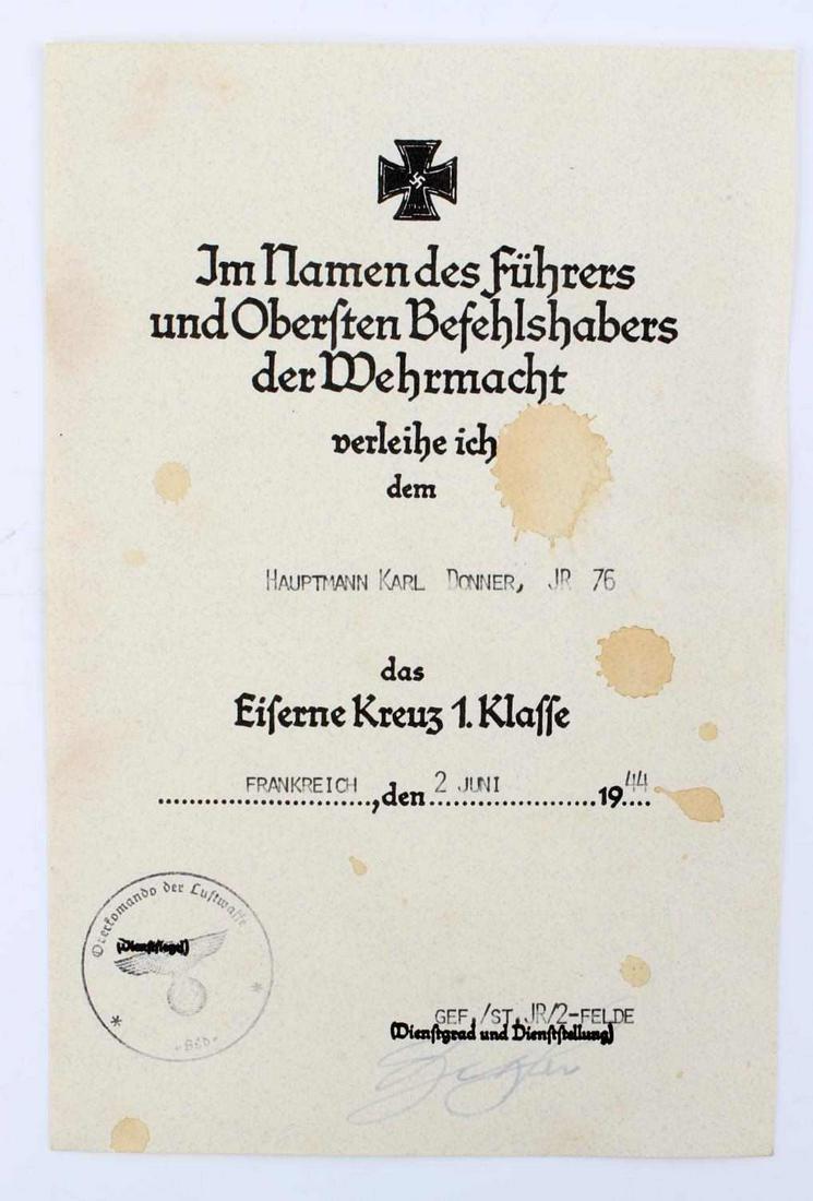 WWII GERMAN REICH IRON CROSS 1ST CLASS AWARD DOC: Named Third Reich Iron Cross 1st Class award document. Named to Karl Donner Hauptmann and dated June 2nd, 1944. Oberkommando of Luftwaffe stamped. Measures 8 1/4 x 5 1/2 inches. Very good condition. B