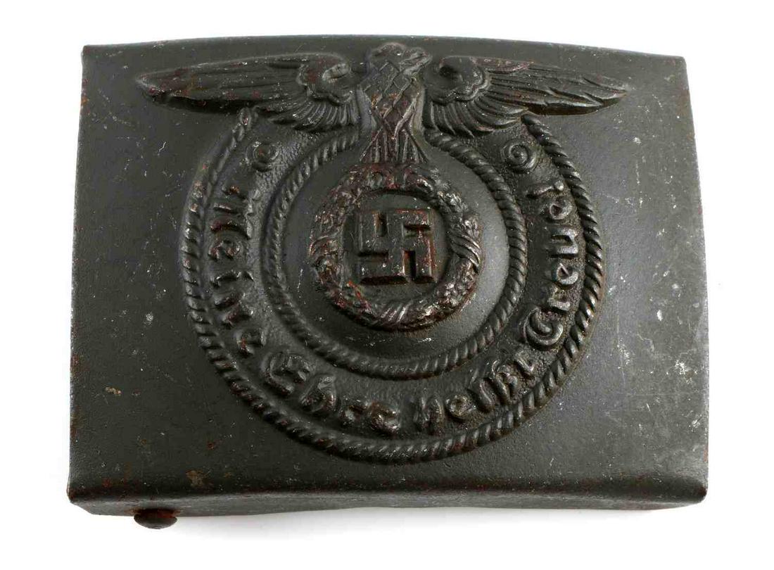 WWII GERMAN WAFFEN SS ENLISTED MAN BELT BUCKLE: WWII German Waffen SS EM belt buckle. Obverse features Reichsadler with "Meine Ehre heist Treue!" below. Two prong and loop to reverse. Maker marked RZM 38/42 SS. Slight oxidation to the prongs. 2 5/8