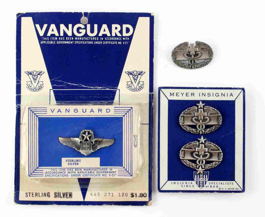POST WWII LOT OF 4 MEYER INSIGNIA & VANGUARD: 2 Meyer Insignia badges for medical service 2nd award with original backing marked sterling, 1 Meyer Insignia for medical service, 1 Vanguard US airforce sterling silver badge in original box.