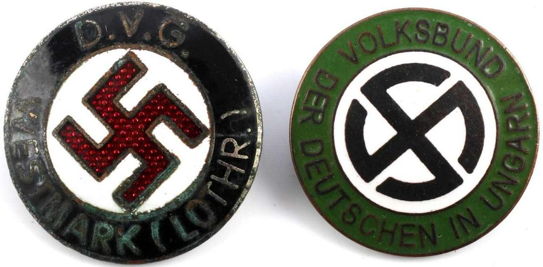 2 WWII GERMAN THIRD REICH DVG HUNGARY PARTY BADGE: Third Reich DVG and Hungarian party badges. DVG badge features enameled black border with red party symbol surrounded by white. RZM Ges Gesch marked to reverse. Very good condition with oxidation. Hun