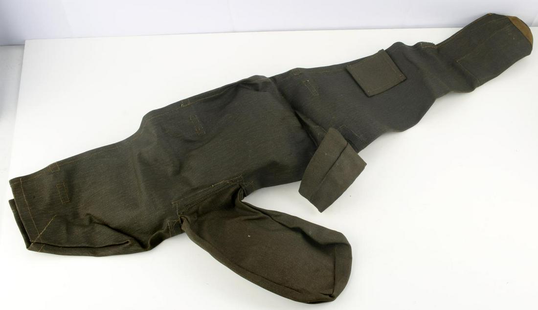 WWII BRITISH STEN MACHINE GUN CARRYING CASE: Army olive green paratrooper machine gun carrying case. Marked with indescernable white lettering. Very good condition. 38 x 12 inches.