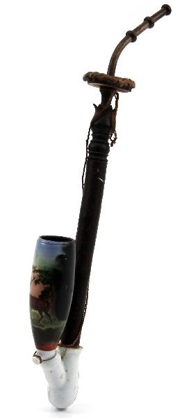 GERMAN HANDPAINTED BLACK FOREST PORCELAIN PIPE: A hand painted German Black forest style ,porcelain pipe, hairline crack to receiver bowl but pipe bowl is good, 6 inch bowl.