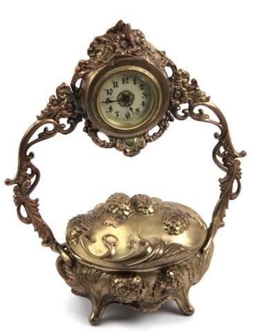 LUX NOVELTY ART NOUVEAU CLOCK WITH JEWELRY BOX: LUX NOVELTY ART NOUVEAU CLOCK WITH JEWELRY BOX Made by the Lux Clock company in Waterbury, Conn. a Art Nouveau stylized pine cones, leaves and branches adorn the jewelry box with hinged lid. The 2.5 i