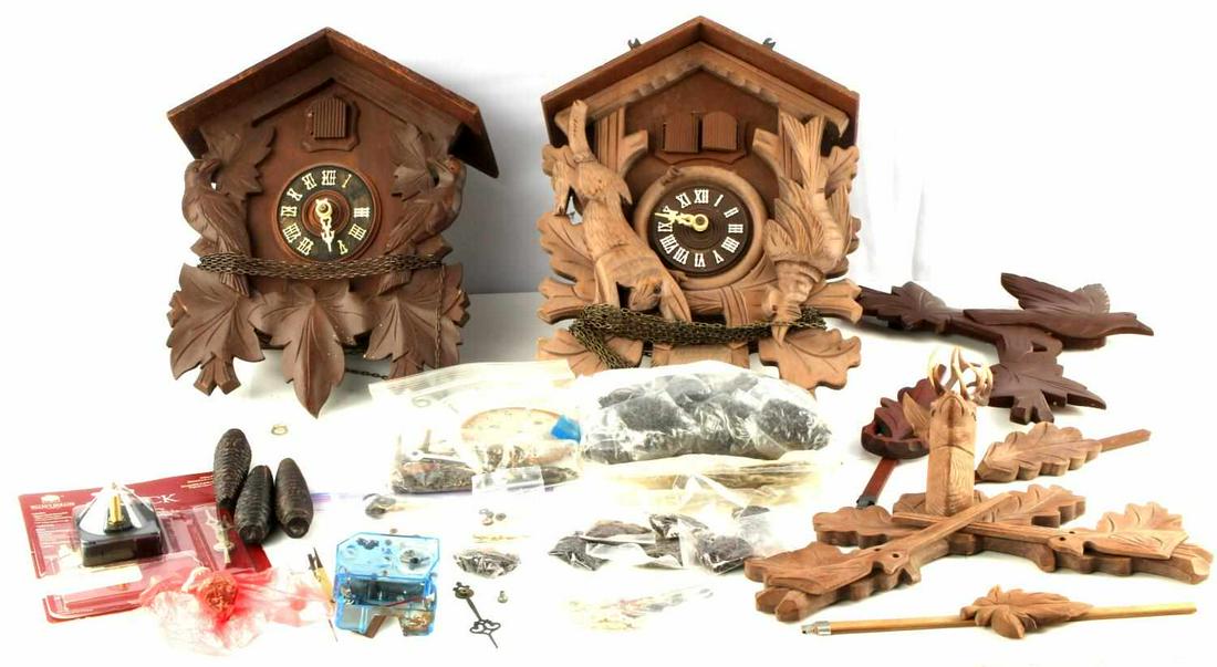 UNSEARCHED BOX OF VINTAGE CUCKOO CLOCKS & PARTS: Box appears to contain two German wooden hand carved cuckoo clocks with a large variety of pieces, clock parts and time parts.
