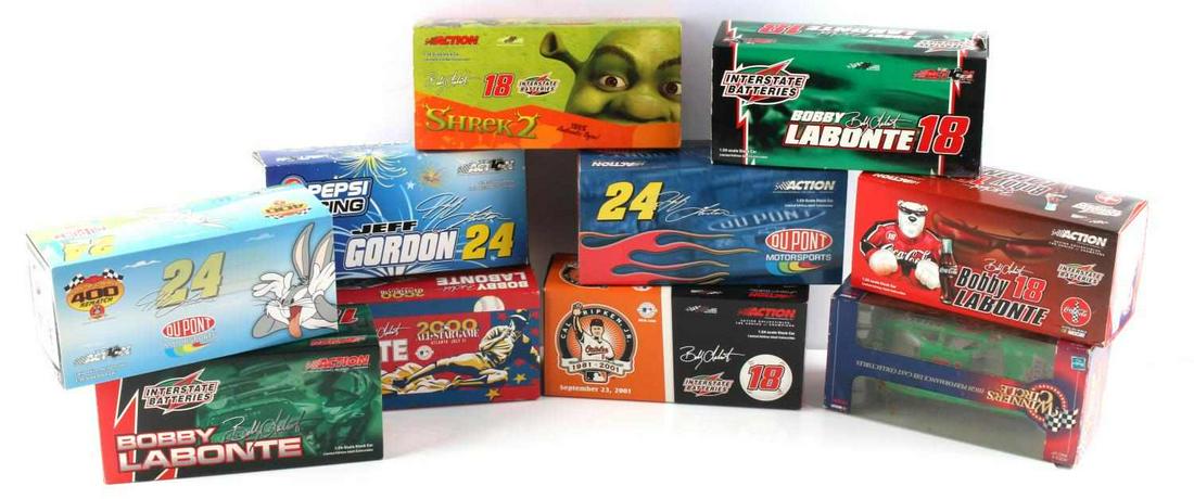 LIMITED EDITION ACTION ADULT COLLECTABLE TOY CAR: The lot includes 9 Action 10th anniversary adult collectable cars. Multiple Bobby Lebonte and Jeff Gordon cars. One Winner's Circle number 18 car.