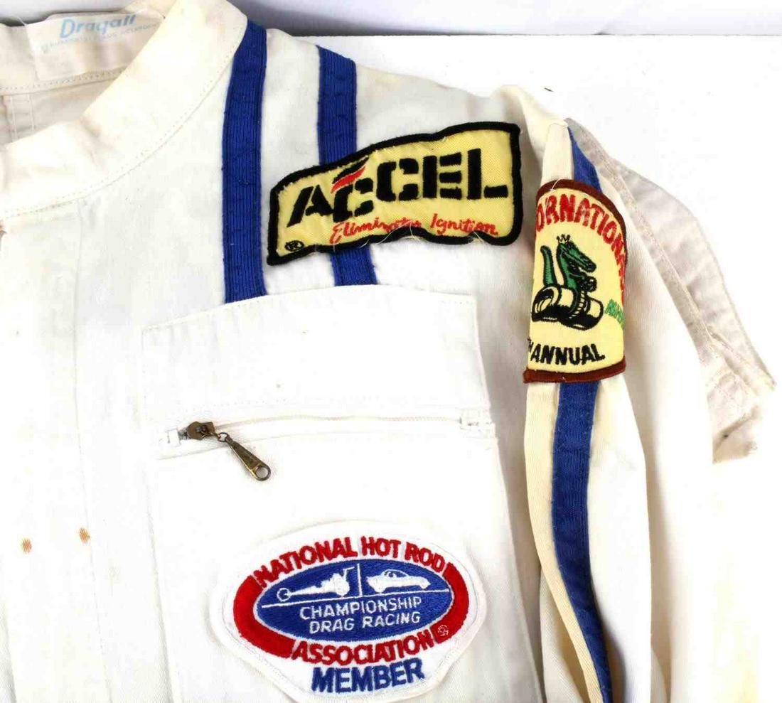 1984 GATOR NATIONALS DRAG RACING PIT CREW COVERALL: Has 1984 and 1985 Gator Nationals shoulder patches and NHRA patches, fire retardant Dragall manufacturer, small size. Some staining otherwise very good.