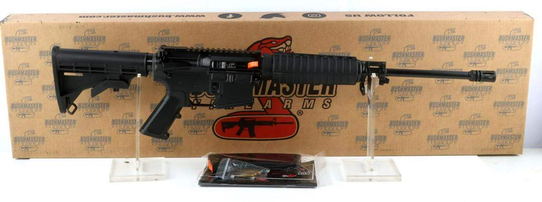 NIB BUSHMASTER XM15-E2S QRC NATO SEMI AUTO RIFLE: Bushmaster QRC, Quick Response Carbine, NATO 5.56/.223 REM Caliber rifle has aluminum upper and lower receiver, 16" Barrel with an overall length of 32.5 inches, C.A.R style hand guard, 6 position col