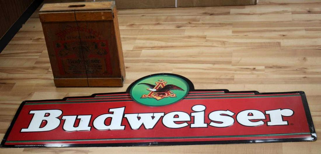 VINTAGE BUDWEISER TIN SIGN AND WOOD CURIO CABINET: Large tin sign measures 59 x 25 inches, good condition. Additional curio cabinet for shot glasses, medicine, etc. Good condition, all parts. Measures 16 x 18 inches, with two hooks on back for hanging