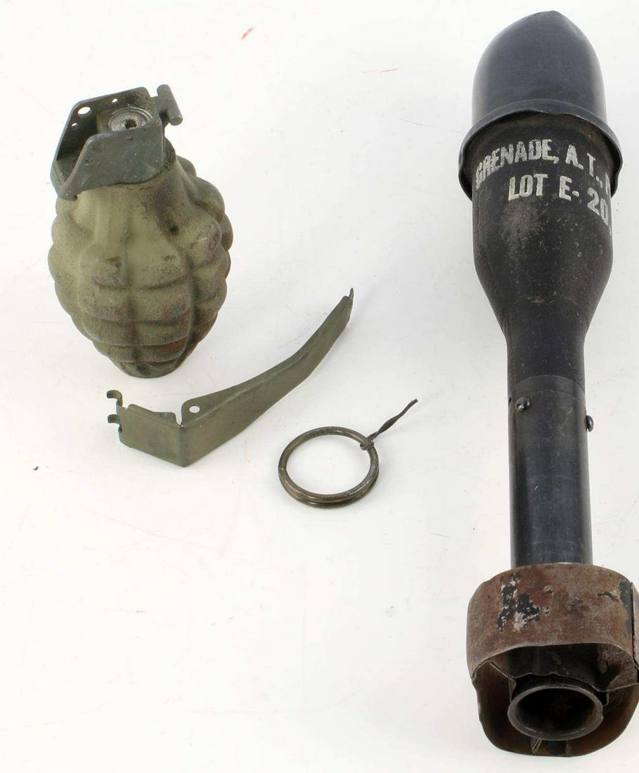 WWII INERT GRENADE LOT OF 2 STICK HAND GRENADE: One M11A2 stick grenade, and one green pineapple hand grenade with pieces separate. Good condition.