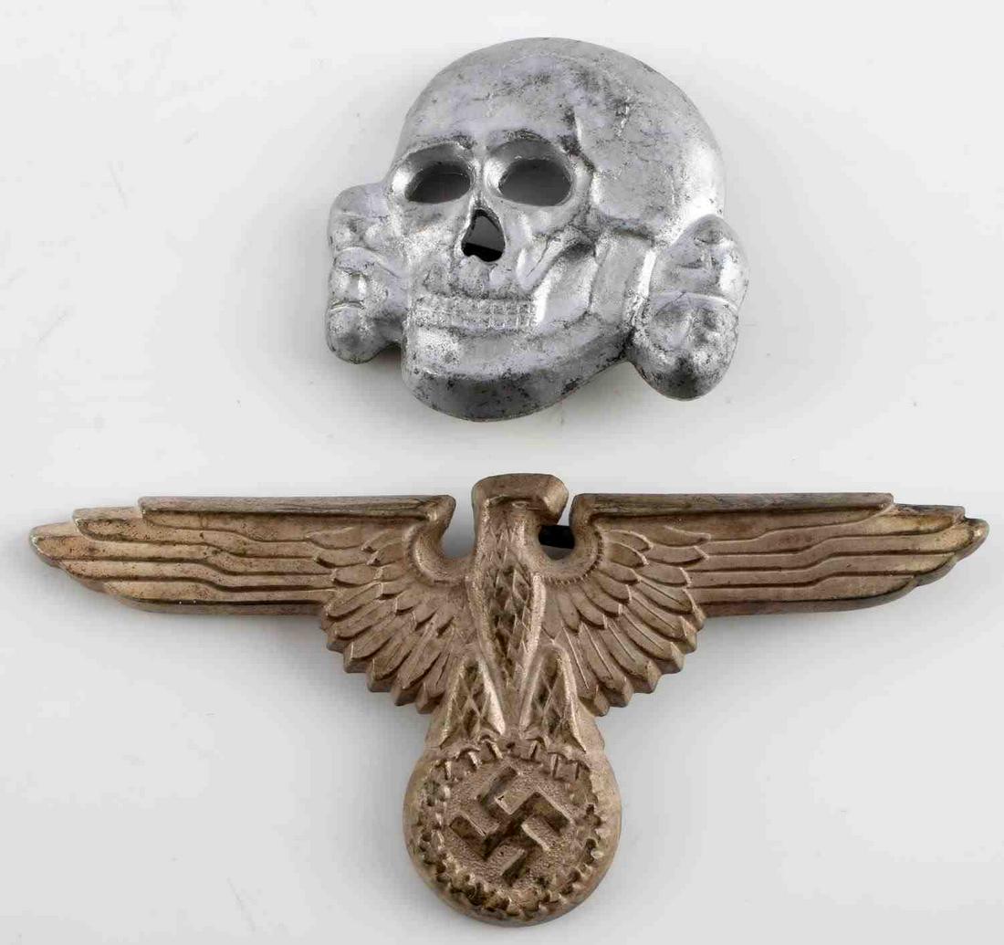 WWII THIRD REICH TOTENKOPF PARTEIADLER VISOR PINS: Two pins meant for visor, one right-facing 2 1/2 inch Partieadler eagle & 1 1/4 inch skull Totenkopf. Lightweight with bendable fasteners. Both maker marked RZM. Unauthenticated, sold as is.