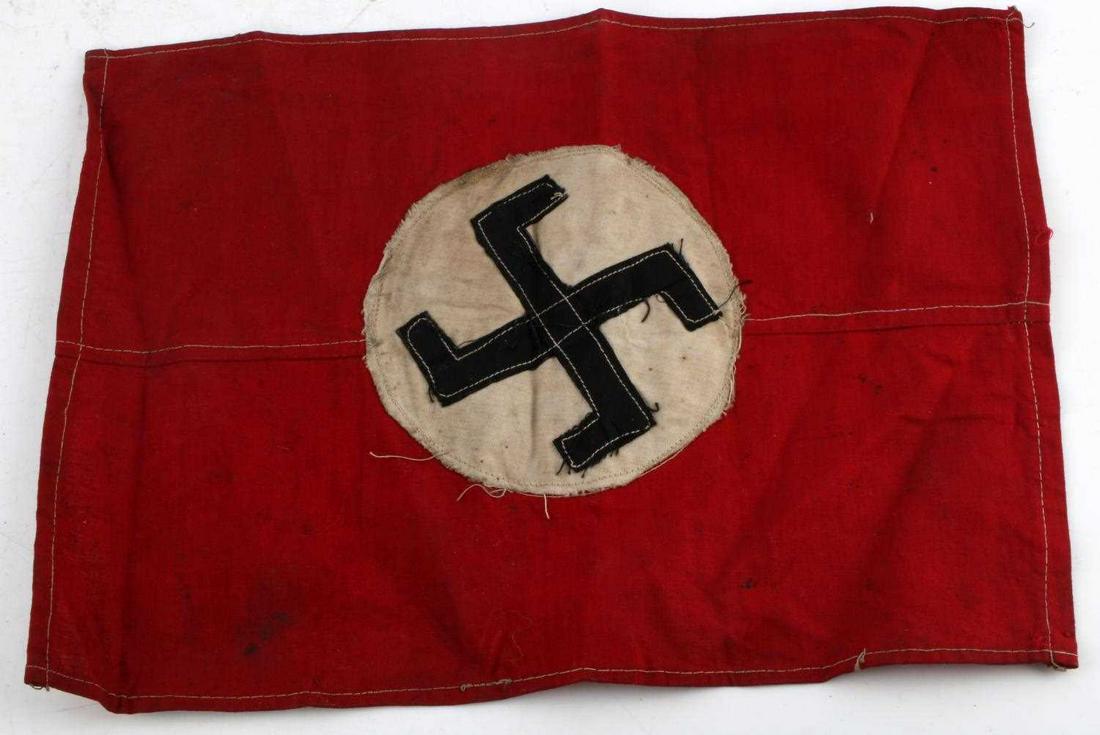 WWII GERMAN THIRD REICH HOME MADE PARTY FLAG: Features national colors of the Third Reich with party symbol. Crude homemade construction. Good condition. Measures 9 x 12 inches. Does not fluoresce.