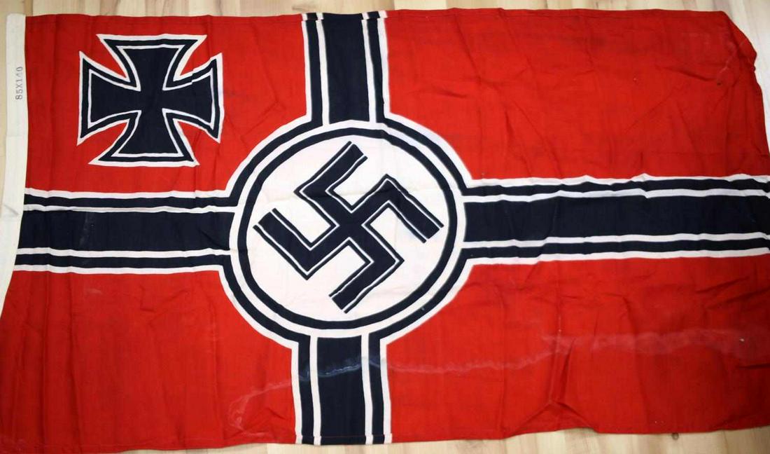 WWII GERMAN 3RD REICH WAR NAVAL SS BATTLE FLAG: WWII German Naval SS battle flag with swastika and iron cross. Stamped with left-facing eagle clutching swastika with M beneath it and dimensions of flag in centimeters on heading. Flag does not fluor