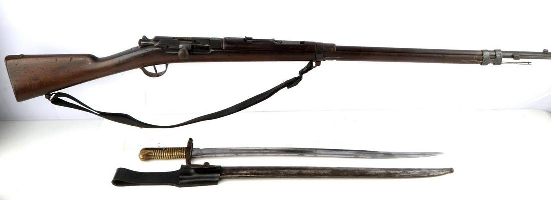 FRENCH ARMY MLE1874 INFANTRY RIFLE & BAYONET SWORD: Original French Army issued "Fusil Gras" MLE 1874, M80 Infantry Rifle with Bayonet Sword & Scabbard. Measures approx. 51 inches in overall length with a 31 inch barrel. 8mm Caliber. Marked "MANUFACTUR