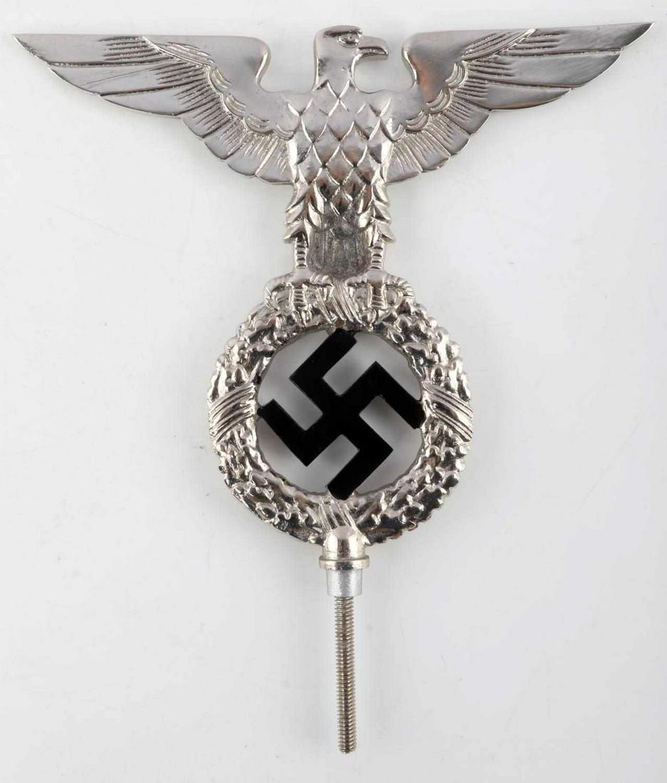 WWII GERMAN THIRD REICH NSDAP PARTY FLAG POLE TOP: Measures 9 inches in length (including the post on the bottom) 8 inches across. Post is 2 inches long. Unauthenticated, sold as is. This lot has a reserve.