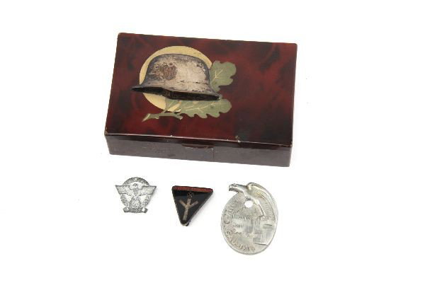 WWII 3RD REICH BOX W PINS FRAUNWERK GAU-TAG: A enameled Wehrmach helmet adorned box of tin and wood 5x3 inches inside a Gau-Tag Tennis , a Frauenwerk ( Womens League) enameled pin and a 1942 service pin.