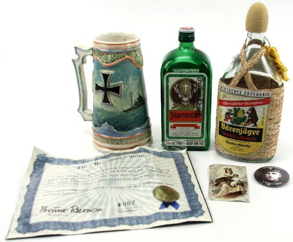 BRUNO RZONCA USA'S ONLY BISMARK SURVIVOR LOT: A grouping of items belonging or signed by Bruno Rzonca , known as Americas only living survivor of the Bismark sinking, a commemorative stein with signed COA, a Funeral notice, 2 signed liquor bottle
