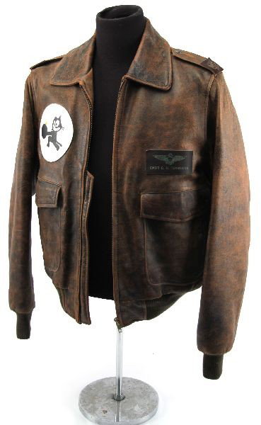 KOREN WAR LEATHER FLIGHT JACKET NAMED: Leather flight jacket named to Cmdr. C. H. Townsend. Believed to be of Korean War era. Fighting 31st squadron patch on right side. Overall good condition with some dust and dirt from age.