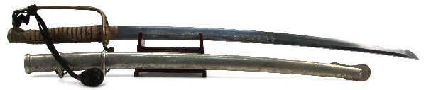 EDO PERIOD KIYOMITSU KATANA KYU GUNTO W HORIMONO: 33 inch shinogi zukuri katana in WWII Imperial Japanese Naval Kyu Gunto mounts. Tang signed Kiyomitsu. Horimono to both sides. Mesame hada. Needs polish. Notare hamon. Slight damage to wire wrap on ha