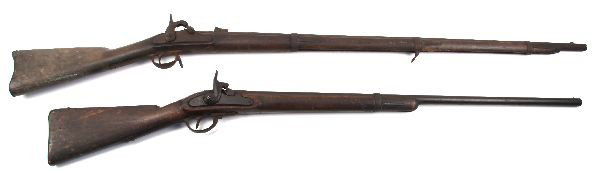 TWO RELIC CONDITION SPRINGFIELD PERCUSSION RIFLES: Pair of Springfield percussion rifles, both in non firing condition. The first has a full stock, with 39 inch barrel, ruptured near top. Markings "1861" and "US SPRINGFIELD" still visible on lock plat