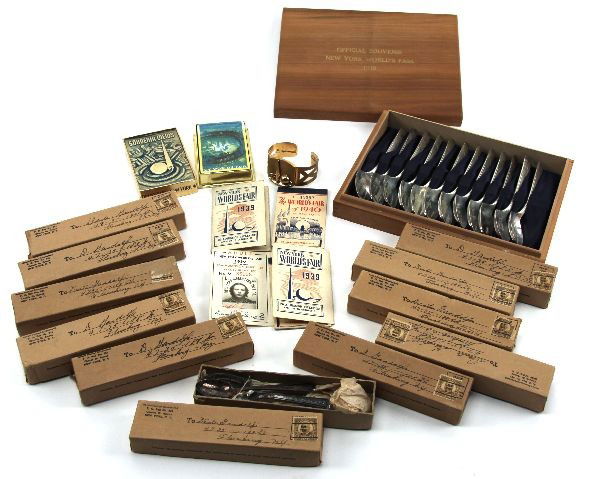 1939 NEW YORK WORLDS FAIR COLLECTION: A original collection of 1939 New York Worlds Fair items as follows, 11 different Worlds Fair spoons each in its original shipping mailer box, 2 entrance photo tickets with 3 partially filled coupon b