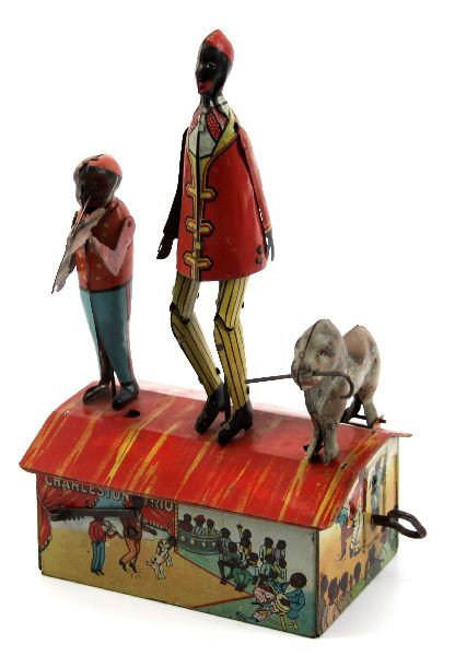 MARX CHARLESTON TRIO WIND UP ANTIQUE DANCING TOY: A brightly painted very good condition rooftop dancing "Charleston Trio" by Louis Marx New York, minimal playwear, 100% original