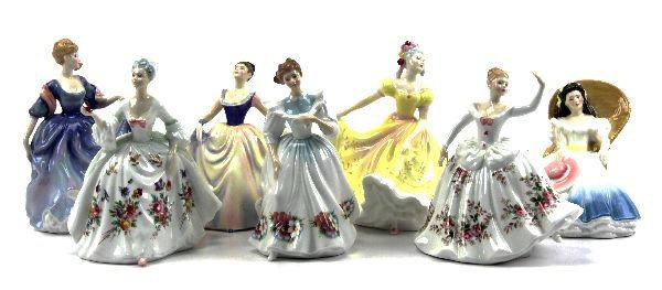7 ROYAL DOULTON FIGURINES 1968 TO 1990: 7 flawless pieces of Royal Doulton figurines as follows, Diane #2468 by Peggy Davis 1985, Lisa 1968 #2394, 1987 figure of the month October by Peggy Davis #2693, Ninette 1970 #2379, Annabel 1989 #3273