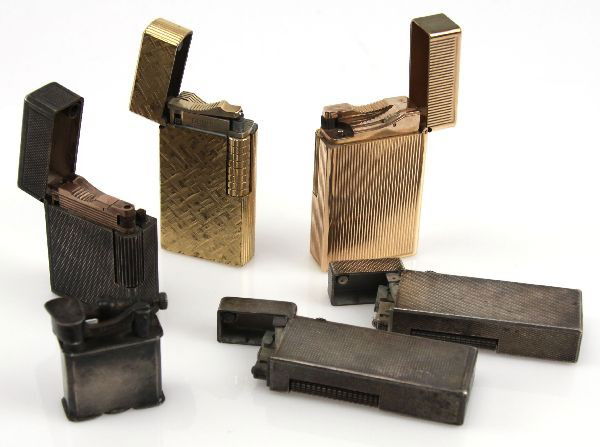 DUNHILL DUPONT MEXICAN SILVER LIGHTER COLLECTION: A 6 piece grouping of antique cigarette lighters consisting of a Dupont 20 micron gold lighter in very good condition, gold plate Dunhill in good condition, silver Dupont in very good condition, 2 Swi