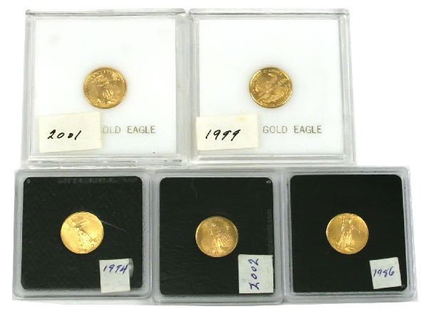 LOT OF 5 GOLD $5 1/10 OZ AMERICAN EAGLE COINS: A grouping of 5 ungraded $5 gold 1/10 oz American Eagle bullion coins. Dates include 1986, 1994, 1999, 2001, and 2002. BU condition in plastic coin holders.