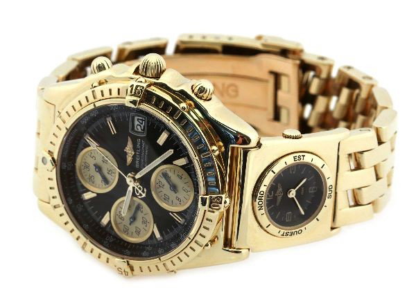 MENS 18K BREITLING CHRONOMAT NBA SPECIAL EDITION: Solid 18K yellow gold limited edition of 25 wristwatches Model #K13050.1. Watch back engraved with NBA label and marked "04/25". Gold sub-dials. Chronometer and tachometer. Secondary watch face set in