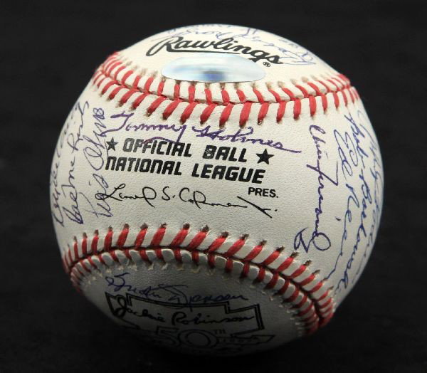 DUKE SNIDER PLUS TEAM AUTOGRAPHED BASEBALL: Official National League baseball signed by Duke Snider with "HOF 80" . There are 24 other autographs on the ball. The ball is a "Jackie Robinson 50th anniversary" ball made by Rawlings. The ball is h
