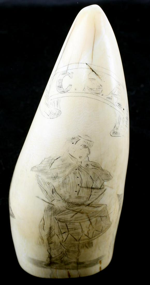 ANTIQUE WHALE TOOTH SCRIMSHAW CSA DRUMMER BOY: Measuring 5 5/8 with a weight of 14.78 ounces, Confederate themed , early 20th century.