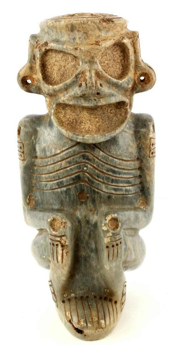 PRE COLUMBIAN TAINO ANTHROPIC CACIQUE OR ANCESTOR: Taino. Anthropic sculpture of a cacique (chief) or ancestor. The figure is posed in a drug induced dream state, sitting with hands on knees, looking forward. The large eyes probably indicate pupils ha