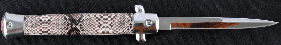13 INCH ITALIAN MADE STONE FOX SWITCHBLADE KNIFE: Italian made Stone Fox switchblade. 10 3/4 inches open. Blade is made of stainless steel. Drop point blade. Very good condition.