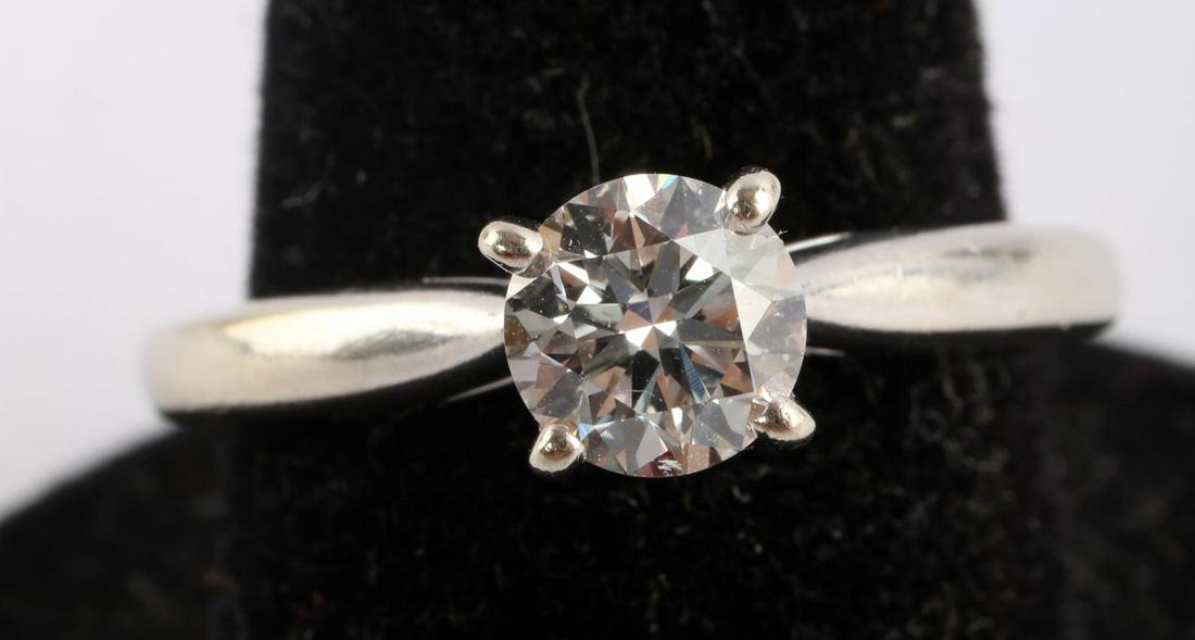 14KT GOLD 0.63CT DIAMOND SOLITAIRE ENGAGEMENT RING: Tested 14kt white gold with 0.63 carat solitaire diamond (lab grown). Approx. color I-J, cut deep round brilliant, clarity VVS) . 4 prong setting. Marked ALTR 14KT 0.63CTW. Size 7 This lot has a reser