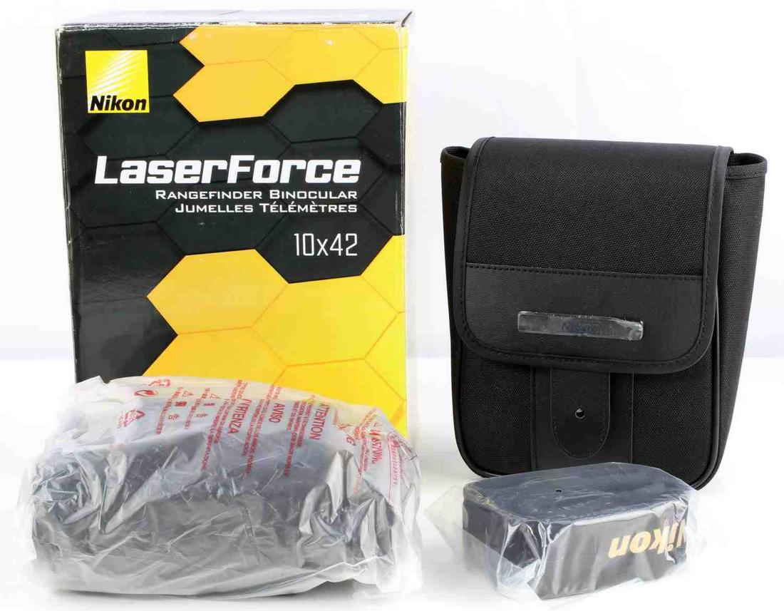 NIKON LASERFORCE RANGEFINDER 10X42 BINOCULAR: Nikon LaserForce Rangefinder binocular with box, paperwork, case. Binocular in very good condition with very light signs of use. Item can view between 10 and 1900 yards. No scratching to the lens. Wat