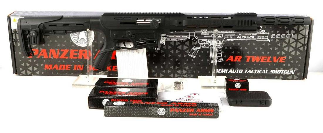 NEW PANZER ARMS AR 12 SEMI AUTO SHOTGUN 12 GA: Steel and polymer construction, maker marked to left side, 12 GA/(3") Magnum marked to left side receiver, AR TWELVE etched to both sides, serial number to guard exterior, 20 inch barrel with mint bor